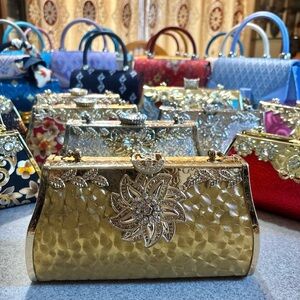 Elegant Gold Clutch with Floral Accents with Crossbody chain strap